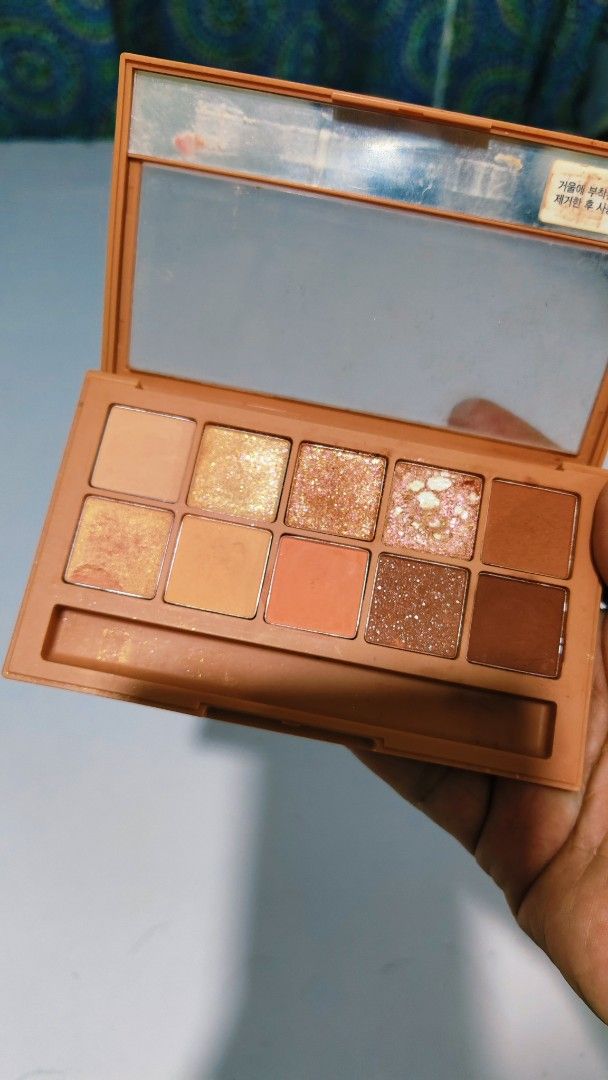 CLIO Pro Eye Palette (Category: Makeup) located in Bulacan. Submitted by babz30261 (Listing ID 1461918712, Image 1). Description: - CLIO Pro Eye Palette - 10 eyeshadow shades - Mix of matte and shimmer finishes - Perfect for warm-toned looks - Some shades lightly swatched - Sold as is.