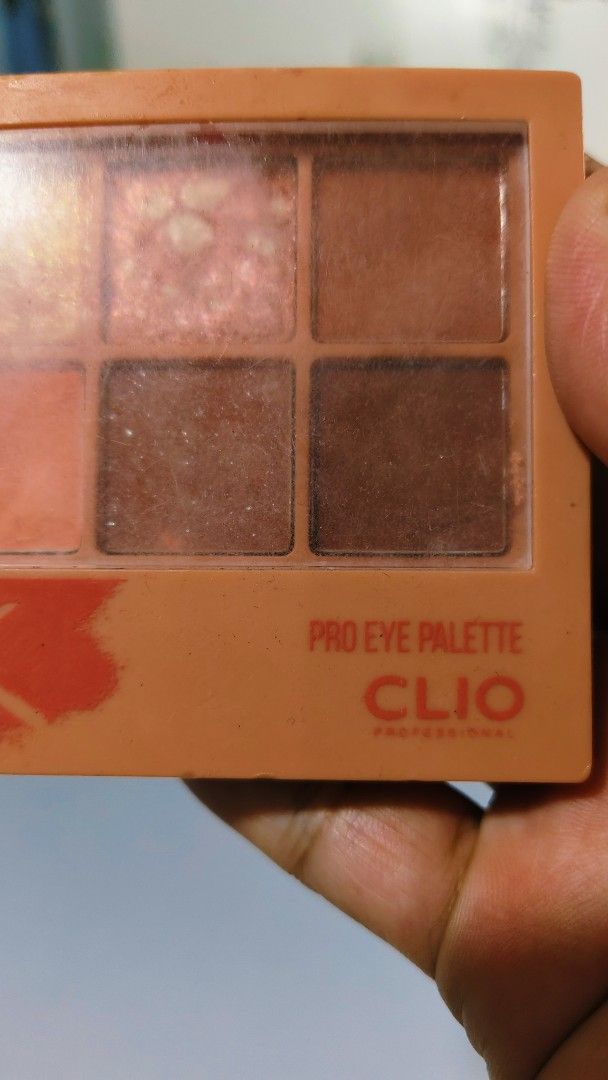 CLIO Pro Eye Palette (Category: Makeup) located in Bulacan. Submitted by babz30261 (Listing ID 1461918712, Image 2). Description: - CLIO Pro Eye Palette - 10 eyeshadow shades - Mix of matte and shimmer finishes - Perfect for warm-toned looks - Some shades lightly swatched - Sold as is.