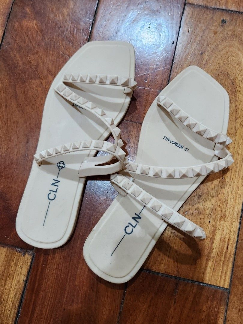 CLN Studded Strap Flat Sandals Size 37 (Category: Flats & Sandals) located in Malabon City. Submitted by ahmabanana (Listing ID 1461915984, Image 1). Description: - Beige CLN Sandals - Size: 37 - Stylish studded straps - Chic square toe design - Convenient slip-on style - Ideal for comfortable everyday wear - Please check photos for detailed condition.