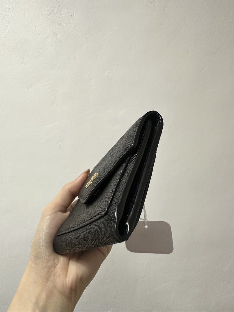 Coach Black Leather Tri-Fold Wallet (Category: Wallets & Card holders) located in Cavite. Submitted by aljennaaaa (Listing ID 1461926106, Image 3). Description: .