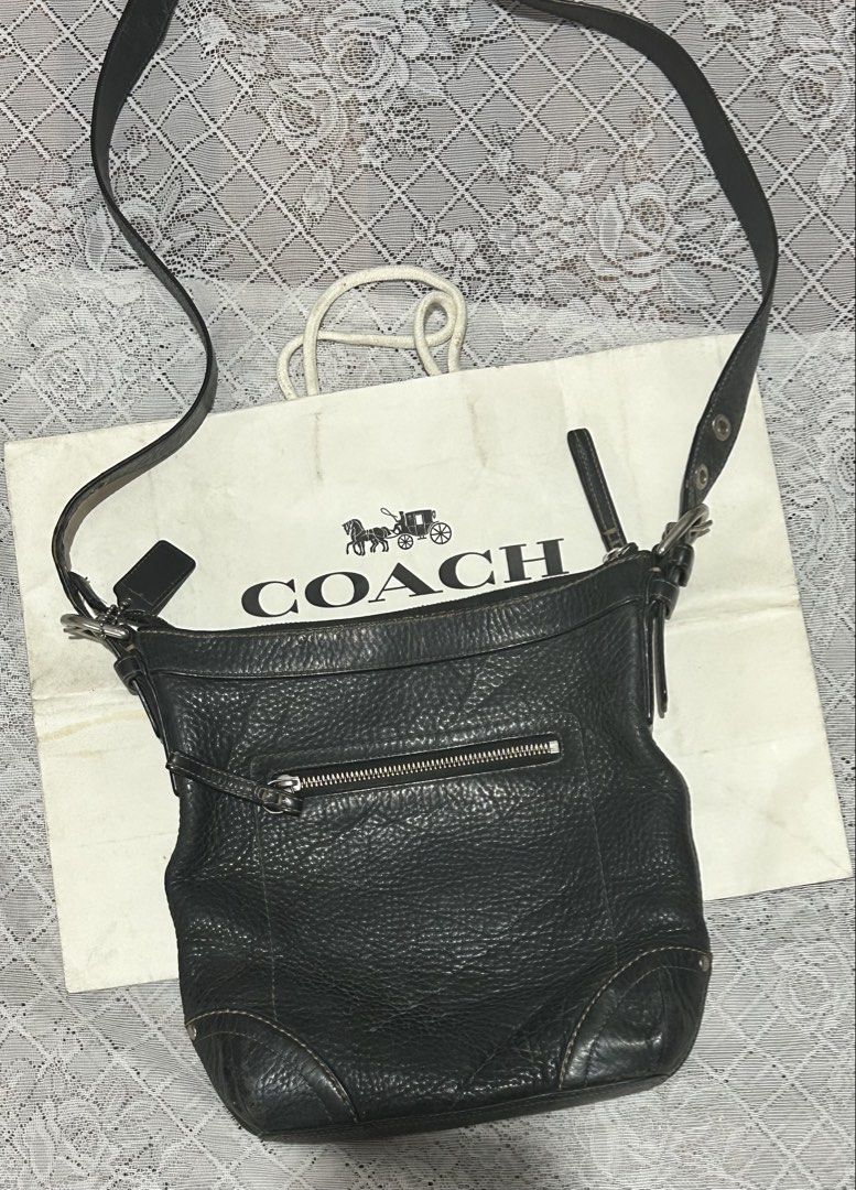 Coach Black pebble Leather Hobo Shoulder Bag (Category: Luxury Bags & Wallets) located in Plaridel. Submitted by ilovebubu28 (Listing ID 1461861627, Image 2). Description: - Authentic black Coach hobo bag - Made from pebbled leather - Zippered top closure - Front zip pocket - Interior with light blue lining - Adjustable strap With coach bagtag.