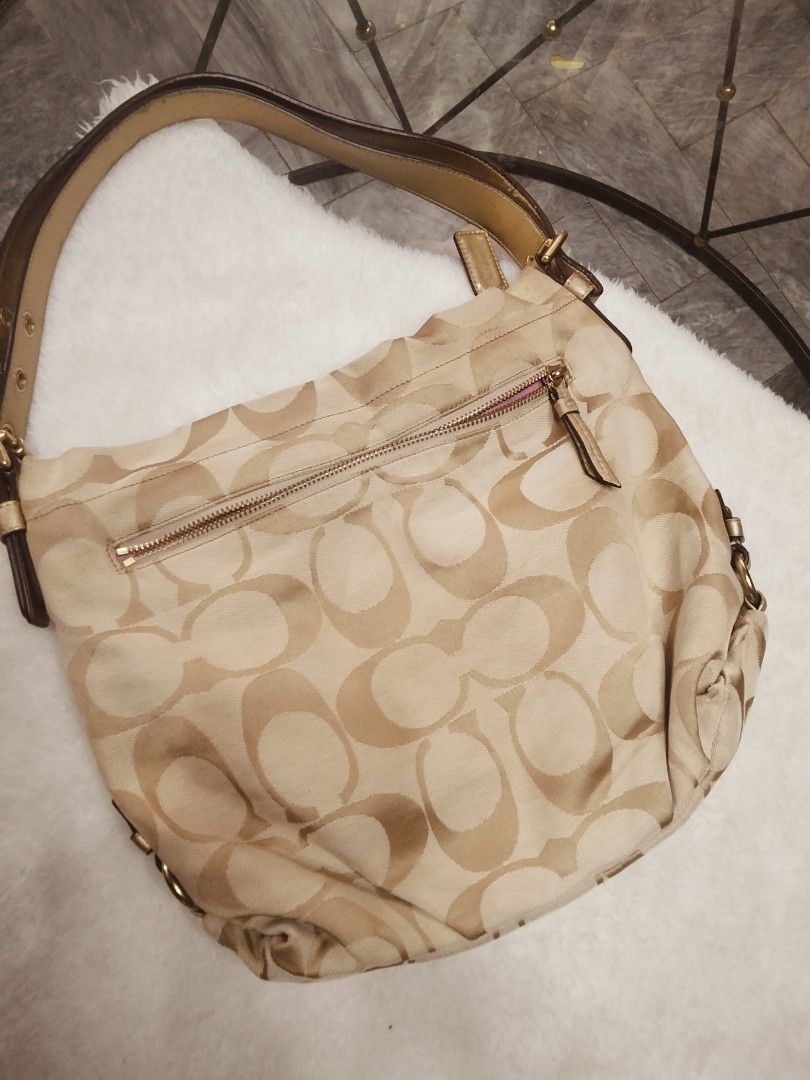 Coach Hobo / sling (Category: Luxury Bags & Wallets) located in Tuguegarao City. Submitted by luxthrifttuguegarao (Listing ID 1461814791, Image 2). Description: like new canvass , issue sa strap nya .. kindly pm me po for more detailed pic po .. super nice pa po ito in actual ...med size .