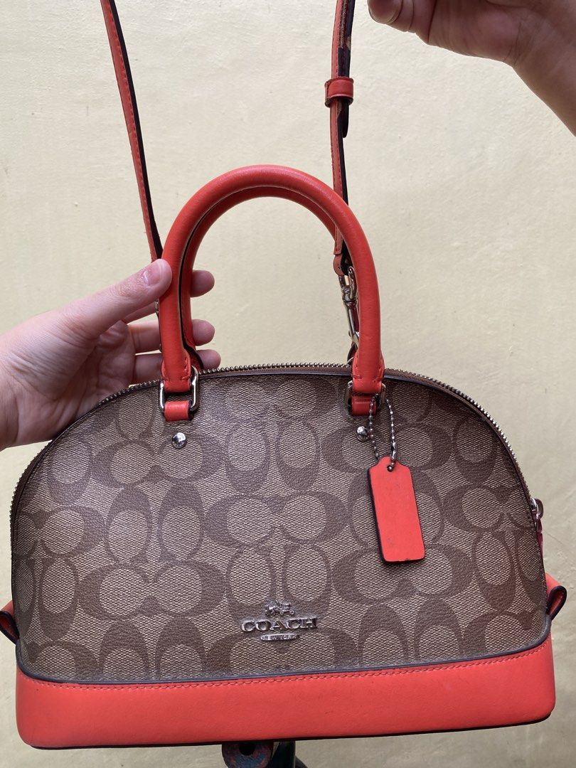 Coach Mini Sierra Satchel (Category: Luxury Bags & Wallets) located in San Mateo. Submitted by leikaclaire (Listing ID 1461811098, Image 3). Description: FOR BIDDING 100% orig, From Japan Used but not abused Nabakbak lang yung sa loob dahil sa init Can do meet up in SM San Mateo or SM Fairview only Can do Lalamove (if NCR) and JnT - Coach Mini Sierra Satchel - Coral leather trim and handles - Secure zip top closure - Interior zip and slip pockets