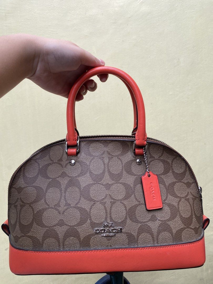 Coach Mini Sierra Satchel (Category: Luxury Bags & Wallets) located in San Mateo. Submitted by leikaclaire (Listing ID 1461811098, Image 1). Description: FOR BIDDING 100% orig, From Japan Used but not abused Nabakbak lang yung sa loob dahil sa init Can do meet up in SM San Mateo or SM Fairview only Can do Lalamove (if NCR) and JnT - Coach Mini Sierra Satchel - Coral leather trim and handles - Secure zip top closure - Interior zip and slip pockets
