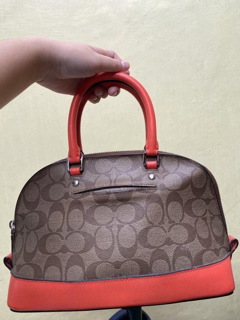 Coach Mini Sierra Satchel (Category: Luxury Bags & Wallets) located in San Mateo. Submitted by leikaclaire (Listing ID 1461811098, Image 2). Description: FOR BIDDING 100% orig, From Japan Used but not abused Nabakbak lang yung sa loob dahil sa init Can do meet up in SM San Mateo or SM Fairview only Can do Lalamove (if NCR) and JnT - Coach Mini Sierra Satchel - Coral leather trim and handles - Secure zip top closure - Interior zip and slip pockets
