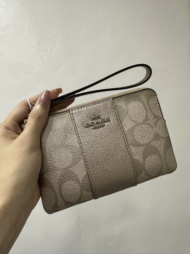Coach Monogram Silver leather wristlet (Category: Purses & Pouches) located in Cavite. Submitted by aljennaaaa (Listing ID 1461909073, Image 1). Description: .