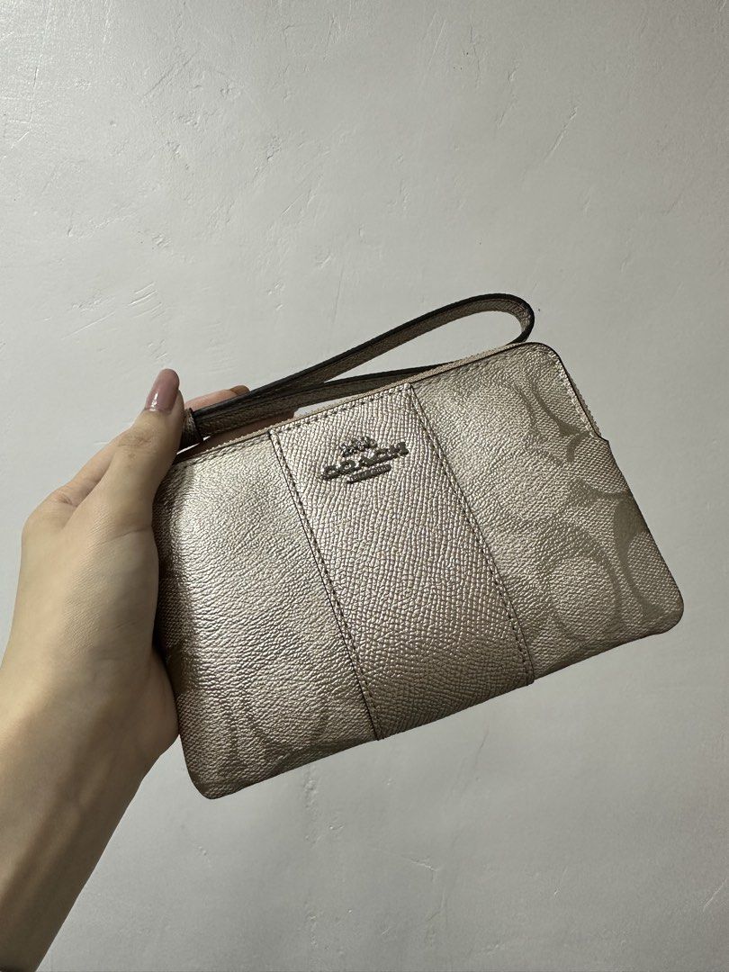 Coach Monogram Silver leather wristlet (Category: Purses & Pouches) located in Cavite. Submitted by aljennaaaa (Listing ID 1461909073, Image 2). Description: .