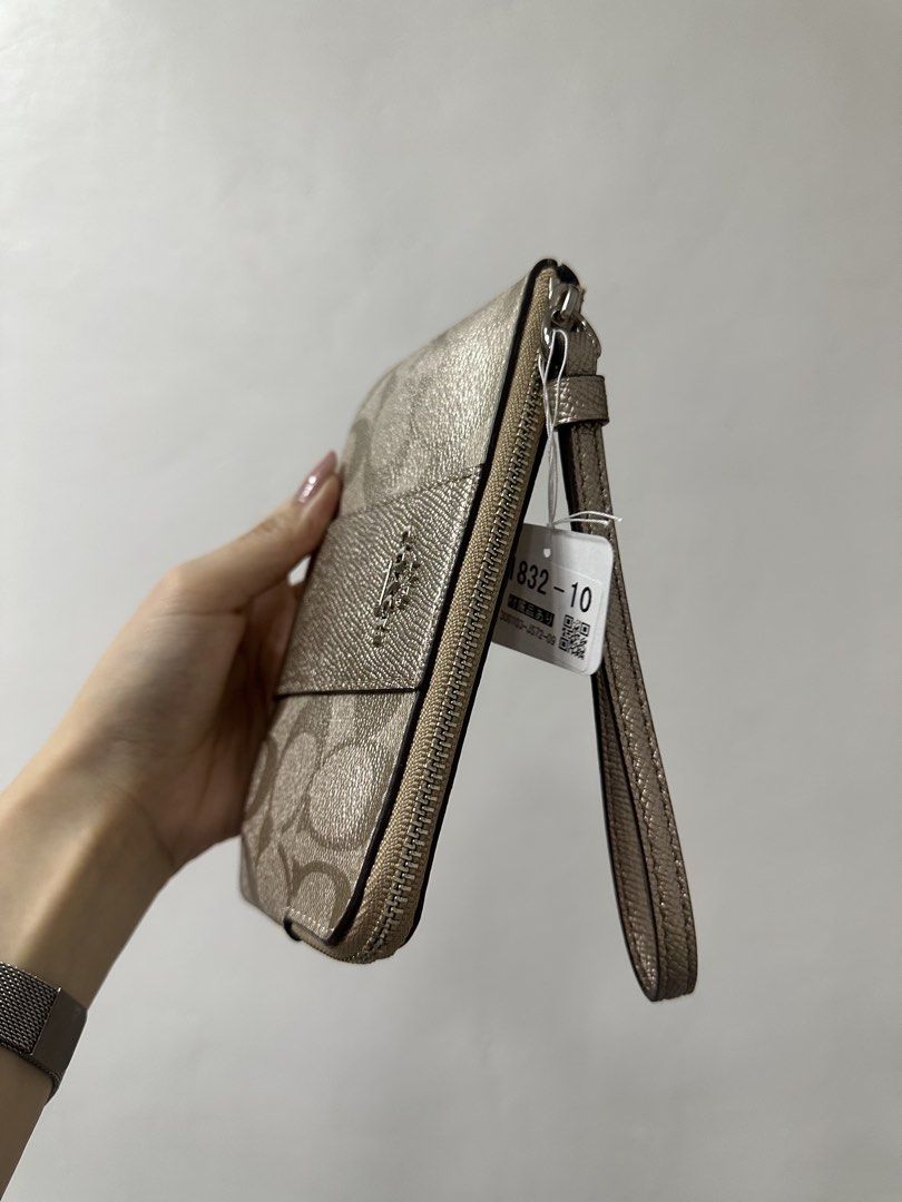Coach Monogram Silver leather wristlet (Category: Purses & Pouches) located in Cavite. Submitted by aljennaaaa (Listing ID 1461909073, Image 3). Description: .