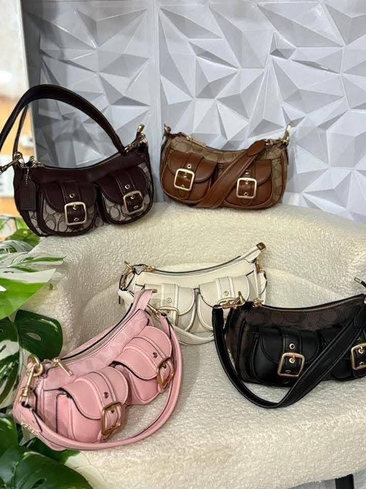 Coach Shoulder Bag - Multiple Colors Available (Category: Luxury Bags & Wallets) located in Manila. Submitted by barbie_nicole17 (Listing ID 1461879068, Image 1). Description: - Cute Coach shoulder bags - Available colors: Brown signature print, Pink, White, Black - Features elegant gold hardware and buckle details - Perfect size for your everyday essentials - Versatile for casual outings or a night out.