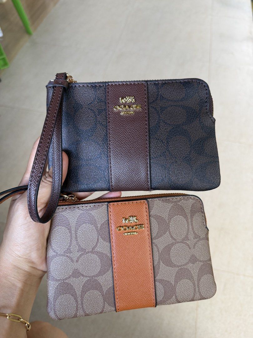 Coach Signature Canvas Wristlet Pouch (Category: Other Bottoms) located in Dumalag. Submitted by pili.ph (Listing ID 1461823958, Image 1). Description: - Two Coach wristlets available - Signature 'C' monogram canvas - Brown leather stripe detail - Gold-tone hardware - Zipper closure - Interior card slots - Ideal for carrying essentials Not Authentic! .