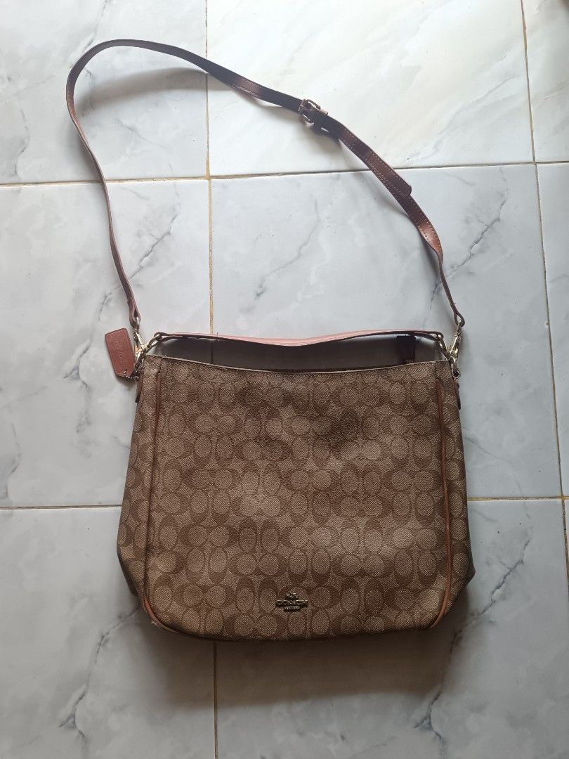 Coach Signature Monogram Shoulder Bag (Category: Shoulder Bags) located in Naga. Submitted by elzza_zenitram (Listing ID 1461861551, Image 1). Description: For sale preloved Premium quality Coach Celeste Convertible Hobo bag -Signature Canvas. With minimal signs of usage. Rfs: no longer in use bawas gamit. For pick-up and delivery only. .