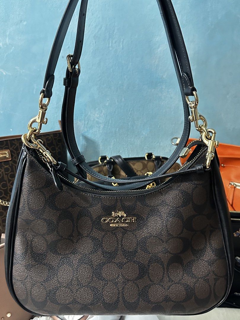 💯 authentic Coach Teri Hobo Bag (Category: Luxury Bags & Wallets) located in Cavite. Submitted by chicfinds.slay (Listing ID 1461925931, Image 1). Description: ✨feel free to message me im hearing offers also ✨for sure buyer can give it for 6k+sf ✨💯authentic ✨flaws minor makeup stain Already cleaned ✨bought in outlet store ✨in pristine condition ✨versatile bag(2way Bag) ✨w/tag and receipt kept 📍Imus,Cavite .