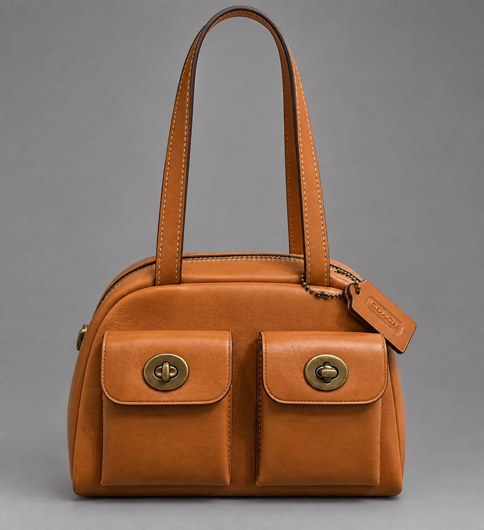 Coach Twin Turnlock (Category: Shoulder Bags) located in Binan City. Submitted by pinkykeenshop (Listing ID 1461935431, Image 1). Description: .