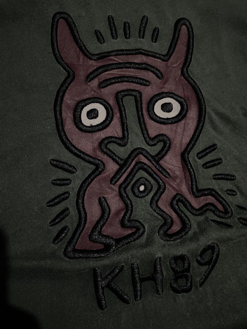 Coach x Keith Haring Graphic Tee Dark Green (Category: Tshirts & Polo Shirts ) located in Santa Cruz. Submitted by _darskieeezz (Listing ID 1461969303, Image 3). Description: Actual Dimes 21 by 27 medium Embroidered Design Looks great!.