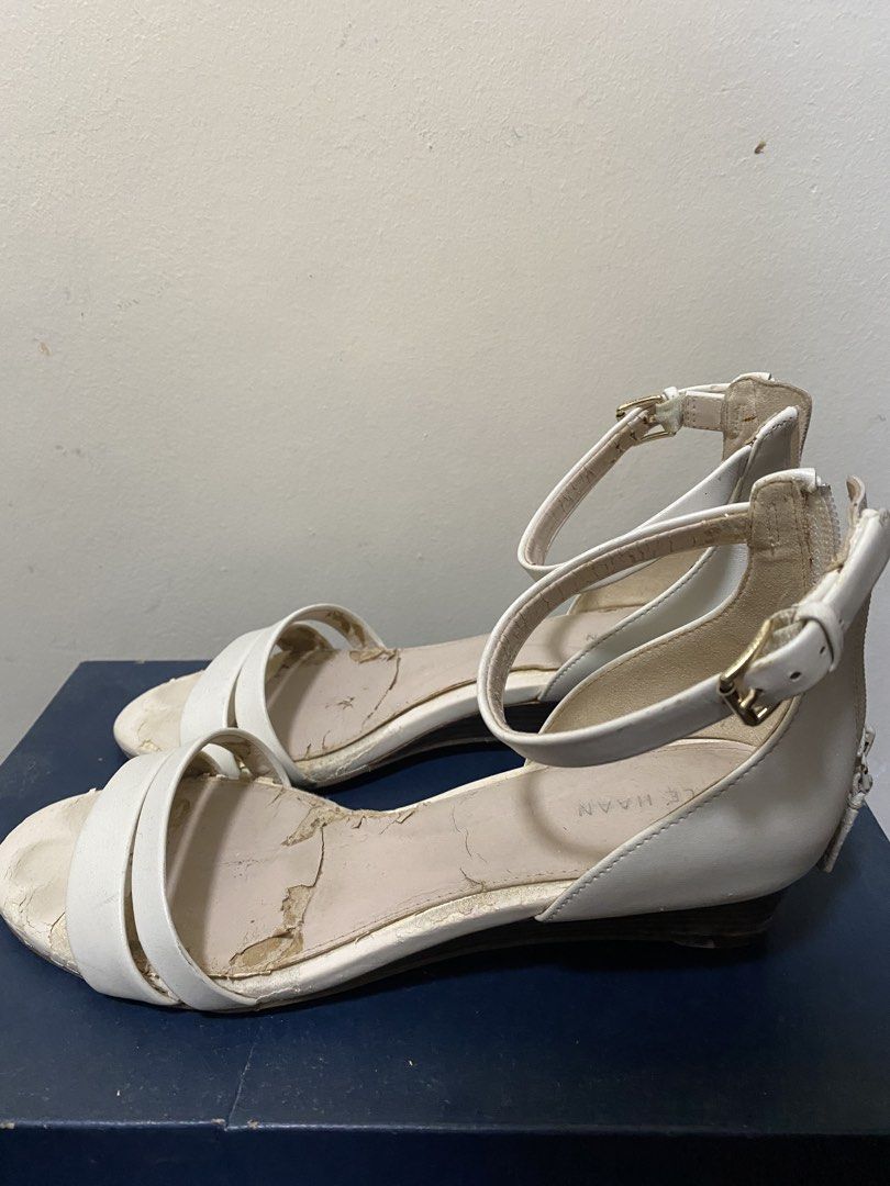 Cole Haan White Leather Ankle Strap Flat Sandals (Category: Flats & Sandals) located in Antipolo. Submitted by jl_2025 (Listing ID 1461894781, Image 1). Description: - Brand: Cole Haan - Material: White Leather - Closure: Ankle strap with buckle - Heel: Low wedge Used 2x and then nakatambak nalang deteriorated because di nagagamit Free SF shouldered by the buyer.
