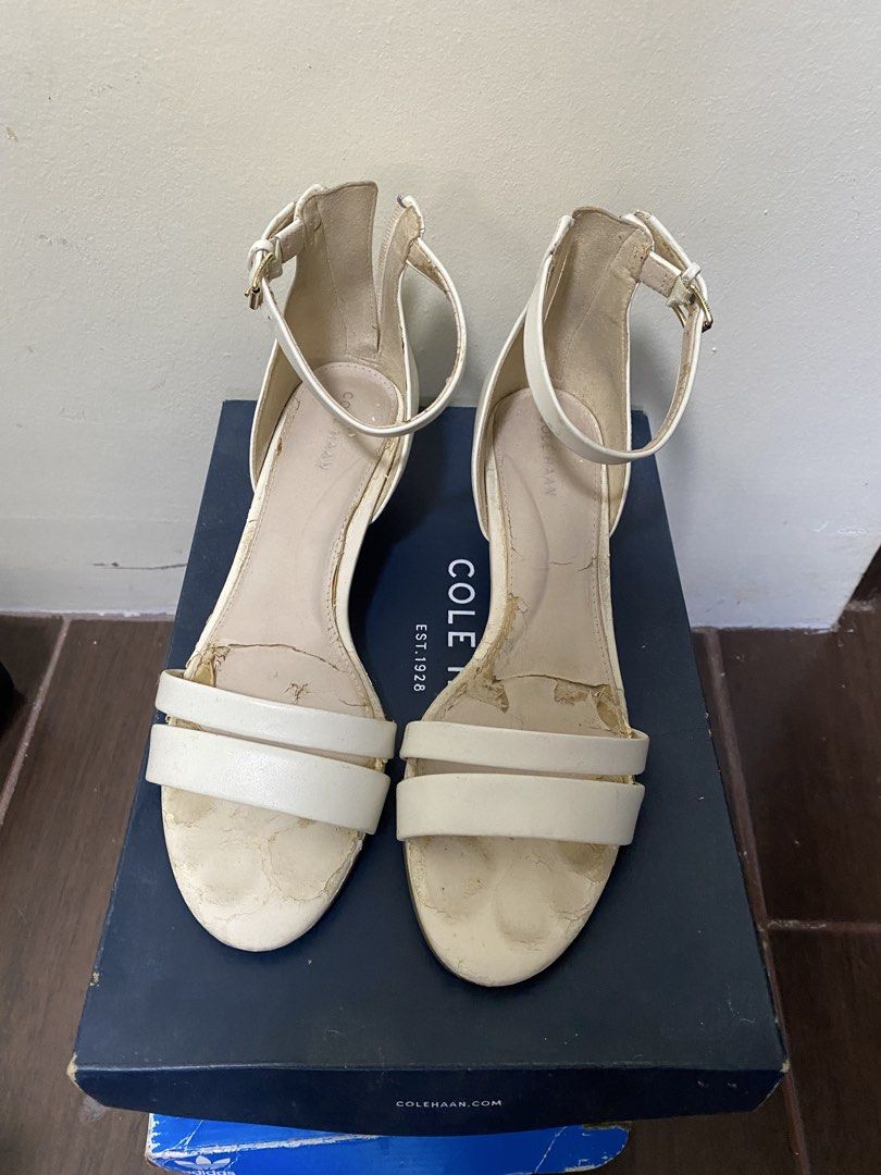 Cole Haan White Leather Ankle Strap Flat Sandals (Category: Flats & Sandals) located in Antipolo. Submitted by jl_2025 (Listing ID 1461894781, Image 2). Description: - Brand: Cole Haan - Material: White Leather - Closure: Ankle strap with buckle - Heel: Low wedge Used 2x and then nakatambak nalang deteriorated because di nagagamit Free SF shouldered by the buyer.