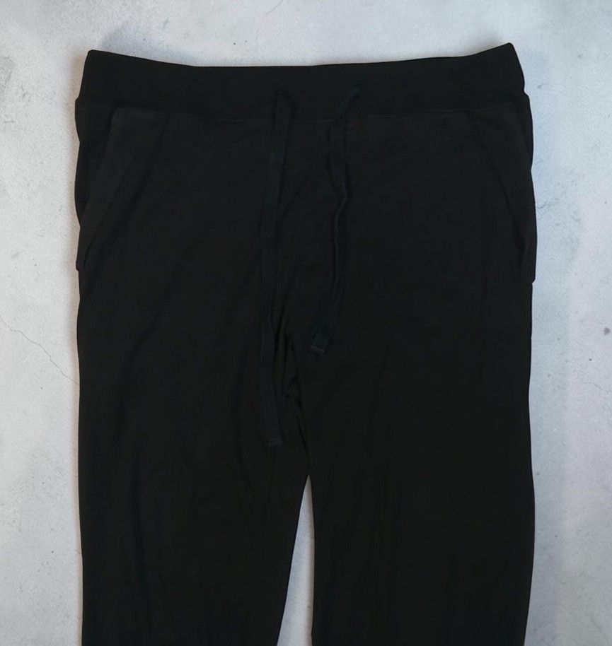 Comme Des Garcons - Black - Jogger Pants (Category: Joggers) located in Manila. Submitted by kinstugi.pieces (Listing ID 1461894289, Image 2). Description: Sizes: L-XL (Uni sex) Dimes: 17 inches, Wst 9.5 inches, Crtch 29 inches, Insm 39.5 inches, Lngth 8 inches, LG Opng Origin: Japan Materials: Cotton 100% Color Rate: 10-10 Condition: 10-10 Presentable to Use Add Shipping fee.