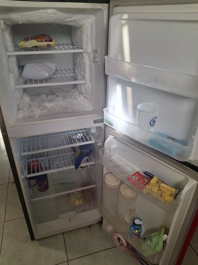 Condura Red Double Door Refrigerator (Category: Refrigerators and Freezers) located in Manila. Submitted by pattycakes47 (Listing ID 1462016347, Image 1). Description: - Red Condura Double Door Refrigerator - Top compartment for fresh food, bottom for freezer - Still works well - Minor ice buildup in the freezer - Ideal for small households or dorm rooms - Approximate Dimensions: 2ft (W) x 4.5ft (H) x 2ft (D) - Pick up only - RFS my mom's moving 