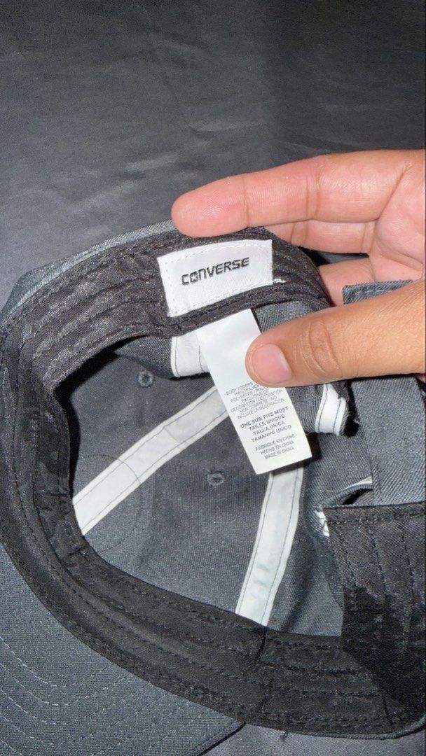 Converse Cap (Category: Caps & Hats) located in Manila. Submitted by nobleangel (Listing ID 1461829500, Image 2). Description: - Classic black Converse cap - Features iconic circular logo on the front - Adjustable strap at the back for a customized fit - Versatile and perfect for everyday wear.