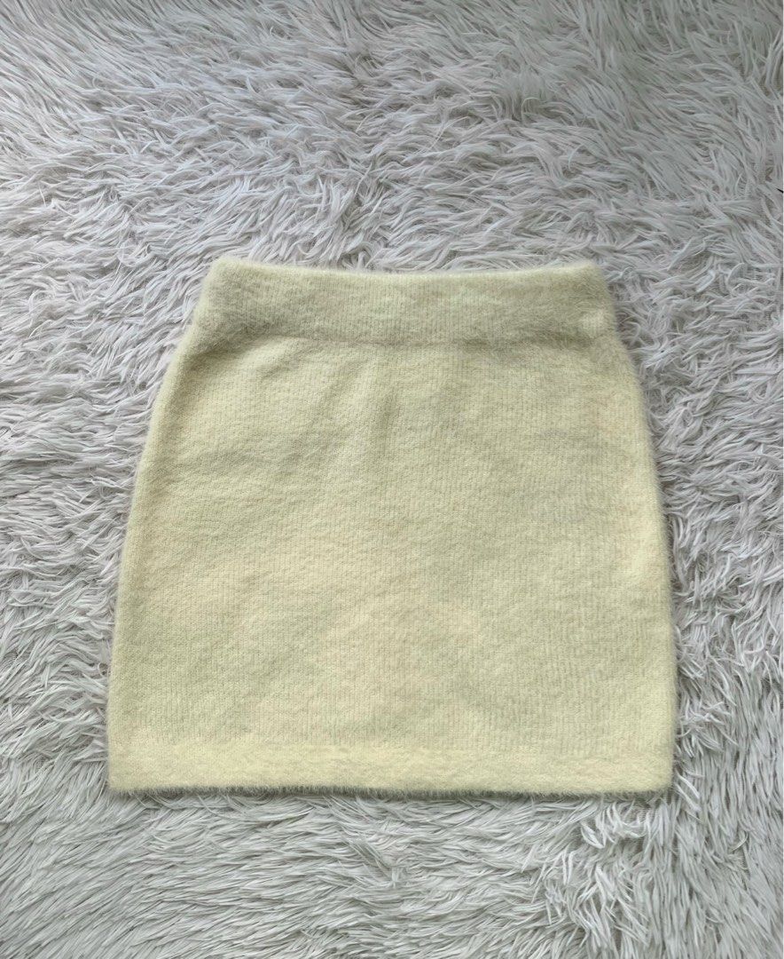 Cream Fuzzy Knit Mini Skirt (Category: Skirts) located in San Carlos. Submitted by findsbymiles (Listing ID 1461896170, Image 1). Description: waist: 24-28 no issues sf will be shouldered by the buyer mop: gcash | mod: jnt delivery 📍san carlos, pangasinan.