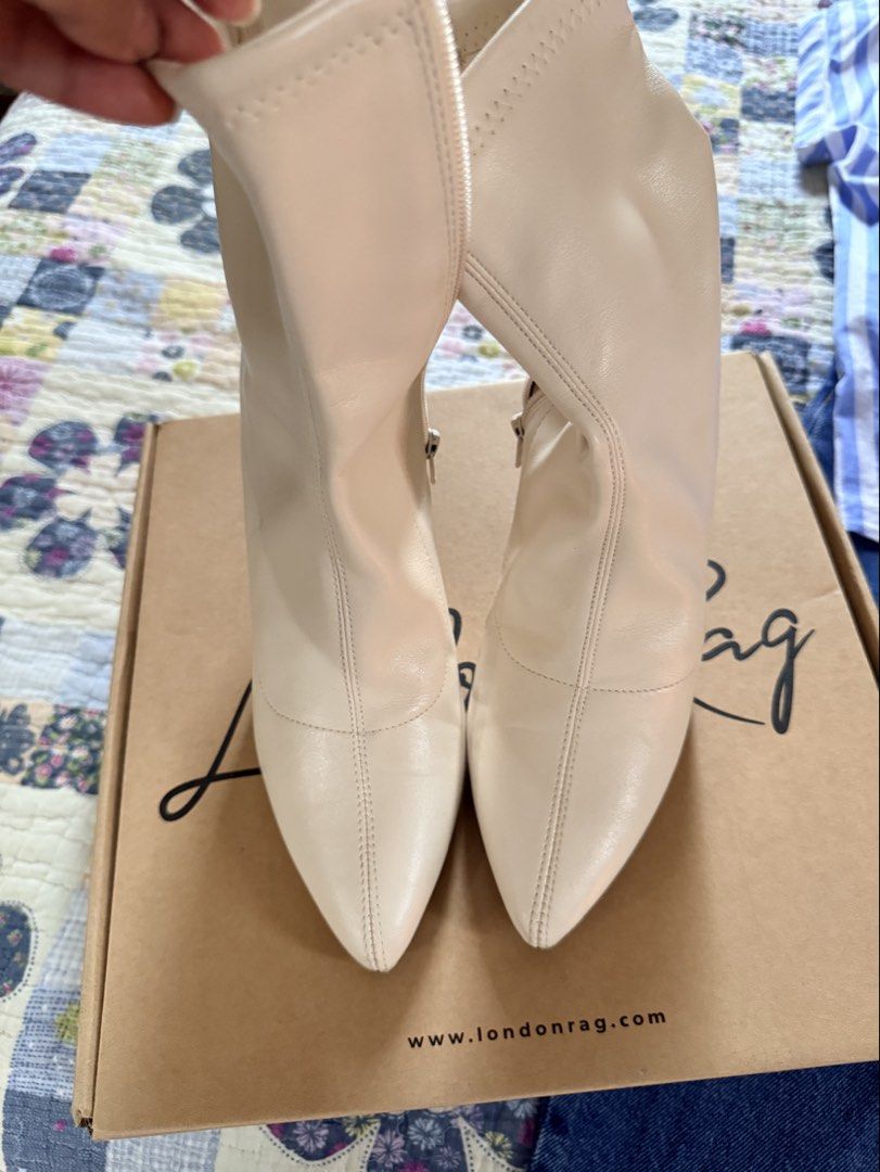 Cream/Ivory Sock Boots (Category: Boots) located in Quezon City. Submitted by yourheaduhunter (Listing ID 1461991081, Image 2). Description: - Brand: London Rag - Color: cream - Style: Ankle sock Boots - Toe: Pointed - Heel: Stiletto - Closure: Side zipper - Versatile: Great with jeans or skirts - Includes: Original box - Heel: 3”.