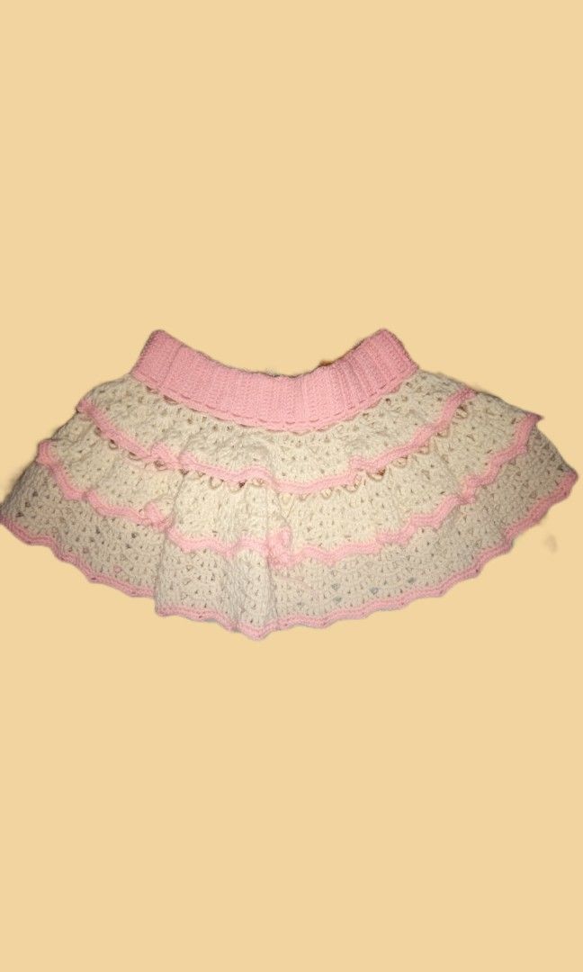 Crochet mini skirt (Category: Skirts) located in Manila. Submitted by warmfalcon-9e2e (Listing ID 1461863695, Image 1). Description: • Used Once • Color: Baby pink and Cream • For reference, my height is 149 cm. waistline is 26 inches. • Handmade by my mom. • Only meetups and lalamove..