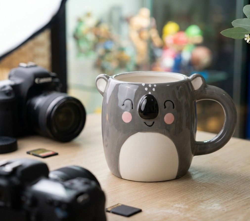 Cute Koala Ceramic Mug (Category: Coffee & Tea Tableware) located in Marikina City. Submitted by mdcterencio (Listing ID 1461926821, Image 1). Description: - Adorable koala design - Grey with white belly and pink cheeks - Features cute ears and a shiny black nose - Ideal for morning coffee or tea - Makes a wonderful gift for animal lovers - Dishwasher and microwave safe.