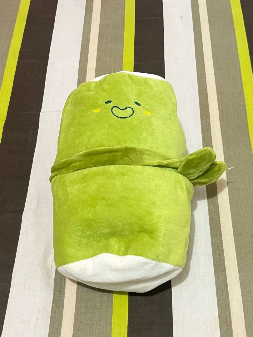 Cute Plushie Pouch (Category: Plushies & Soft Toys) located in Santa Rosa. Submitted by rsxyen (Listing ID 1461992541, Image 1). Description: - Adorable green plush character with a cheerful expression. - Zippered opening reveals a spacious interior. - Interior lined with a cute checkered pattern. - Versatile use: great for storing small items or as a fun decor piece. - Perfect gift for children or enthusiasts of cute plush toys..