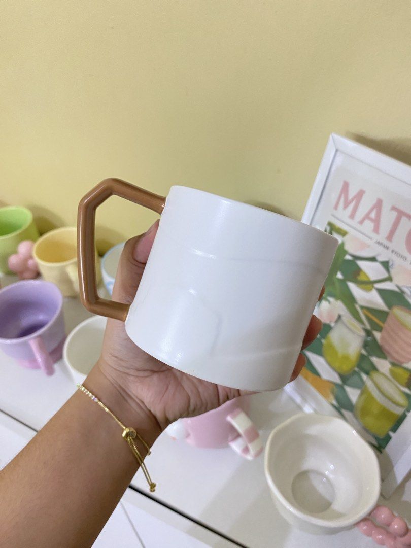 CUTE WHITE WITH BROWN HANDLE MUG (Category: Coffee & Tea Tableware) located in Dasmarinas. Submitted by hannah.oakph (Listing ID 1461861442, Image 2). Description: ₱150 EACH • 2 FOR ₱250.