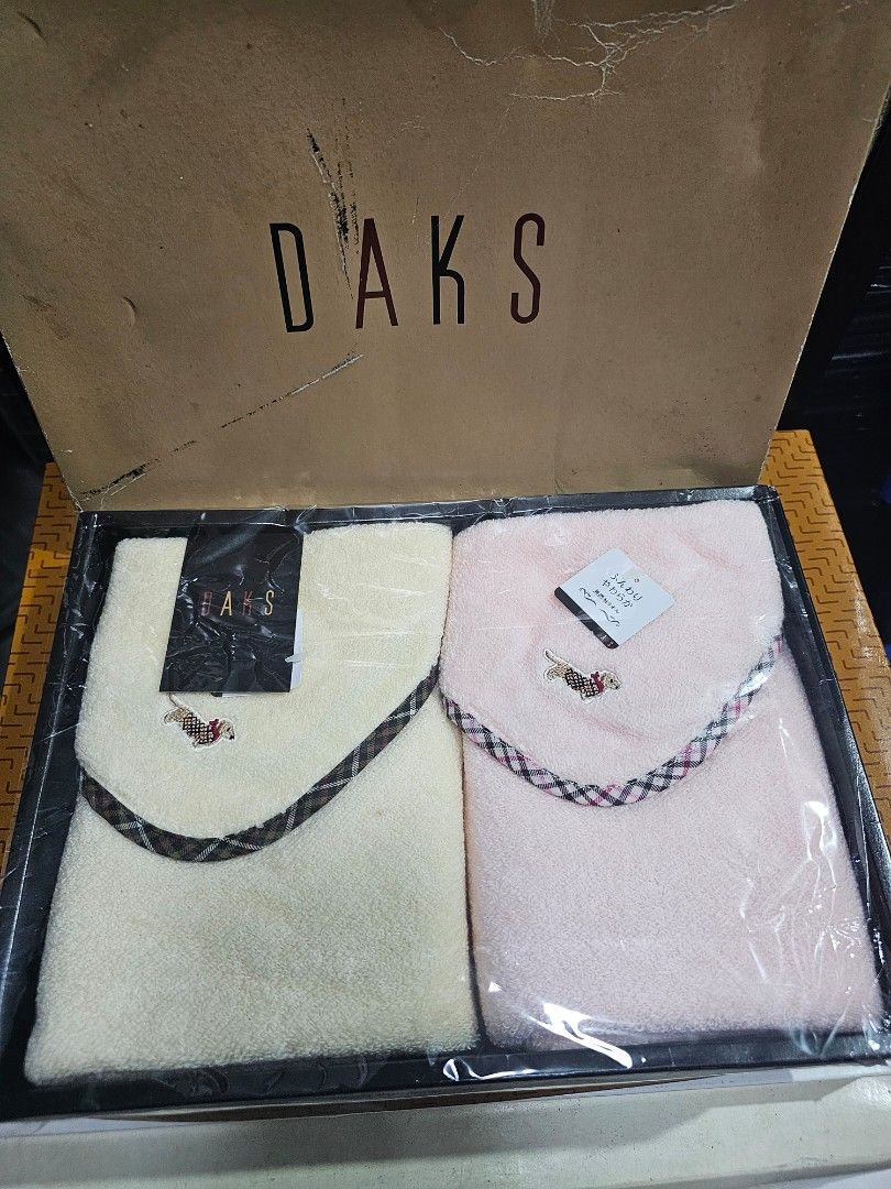 SALE❗DAKS Long Towel - 2 pcs (Category: Bedding & Towels) located in Quezon City. Submitted by senyoramaria (Listing ID 1461937534, Image 1). Description: DAKS Long Towel 2 pcs Pink and Beige 13 x 30 inches Soft material With embroidered dog design *Beige has dot stain. Php700❗.