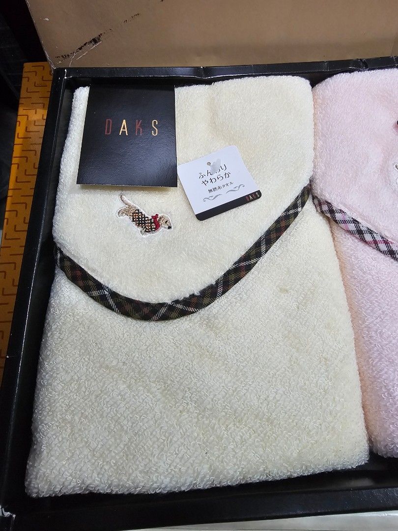 SALE❗DAKS Long Towel - 2 pcs (Category: Bedding & Towels) located in Quezon City. Submitted by senyoramaria (Listing ID 1461937534, Image 2). Description: DAKS Long Towel 2 pcs Pink and Beige 13 x 30 inches Soft material With embroidered dog design *Beige has dot stain. Php700❗.