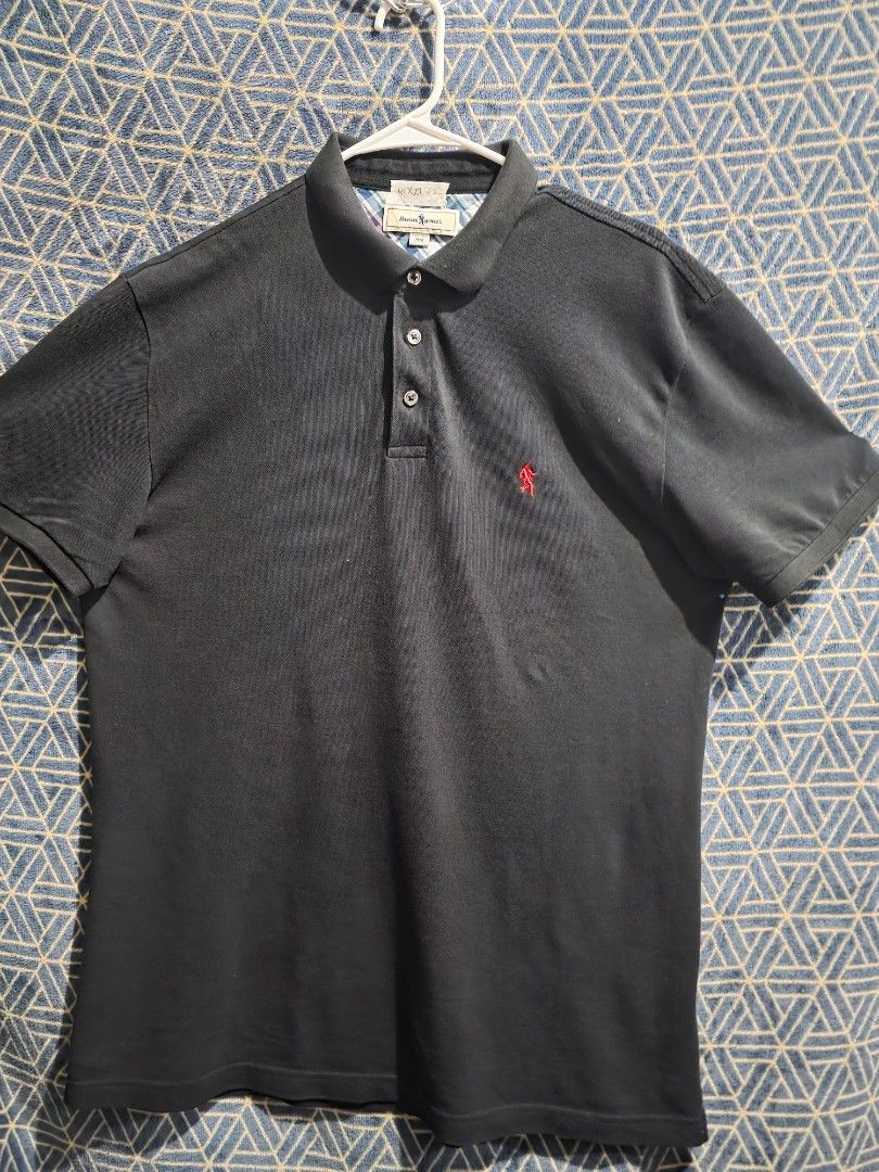 Dancing Wolves Polo Shirt - Black - Size 56 (Category: Tshirts & Polo Shirts ) located in Quezon City. Submitted by kick_mnl (Listing ID 1461870243, Image 1). Description: - Brand: Dancing Wolves - Color: Black - Size: see pic - Features: Small red embroidered logo on chest, subtly engraved buttons, checkered lining on collar - Style: Casual wear.