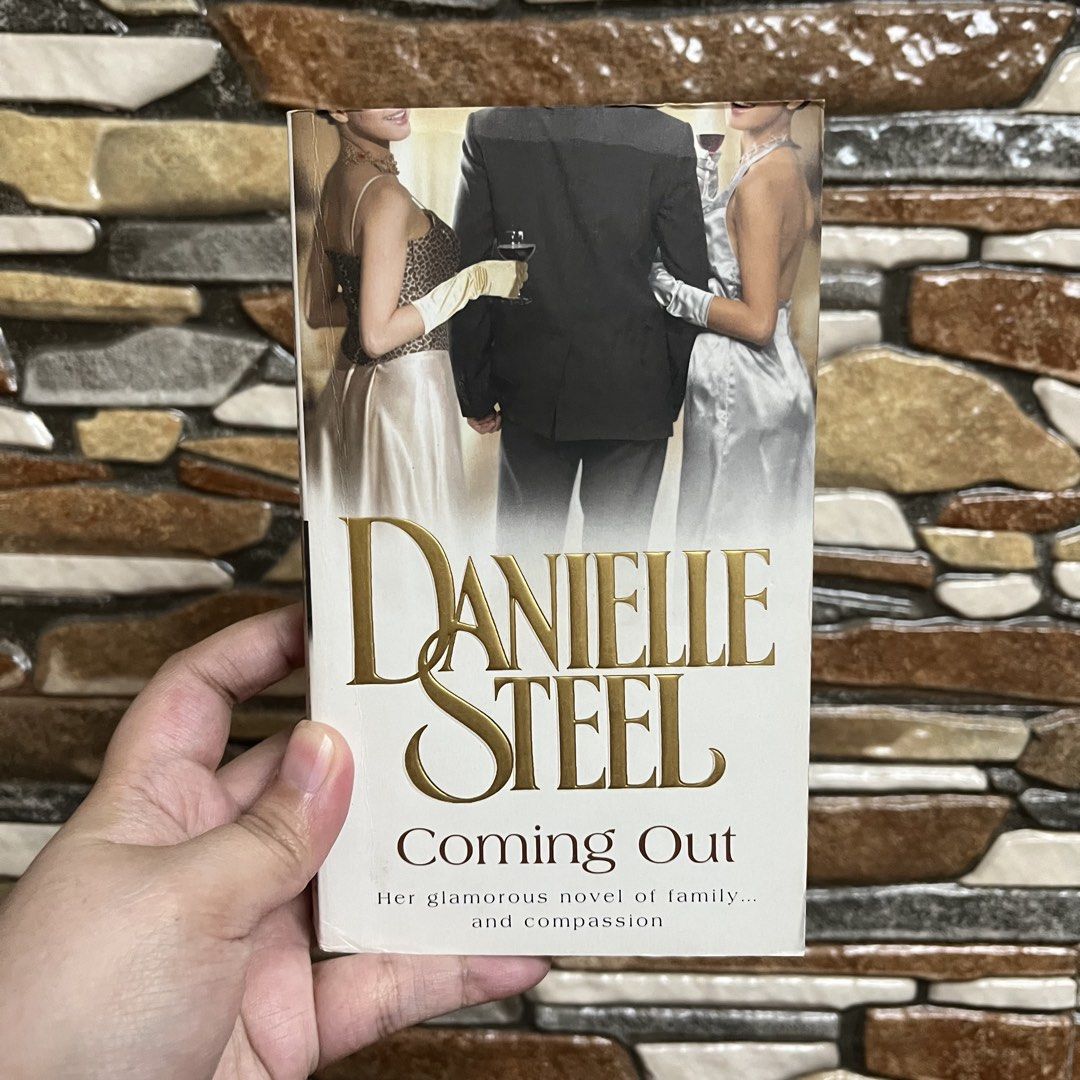 Danielle Steel Coming Out Paperback Novel (Category: Storybooks) located in San Pedro. Submitted by rainyydayy (Listing ID 1461964121, Image 1). Description: - Title: Coming Out by Danielle Steel - Genre: Romance / Family Drama - Themes: Family, love, compassion, emotional journeys - Plot: Follows Olympia's life, career, marriage, and her daughters' coming of age. - Style: Glamorous novel - Perfect for: Your next captivating read!.