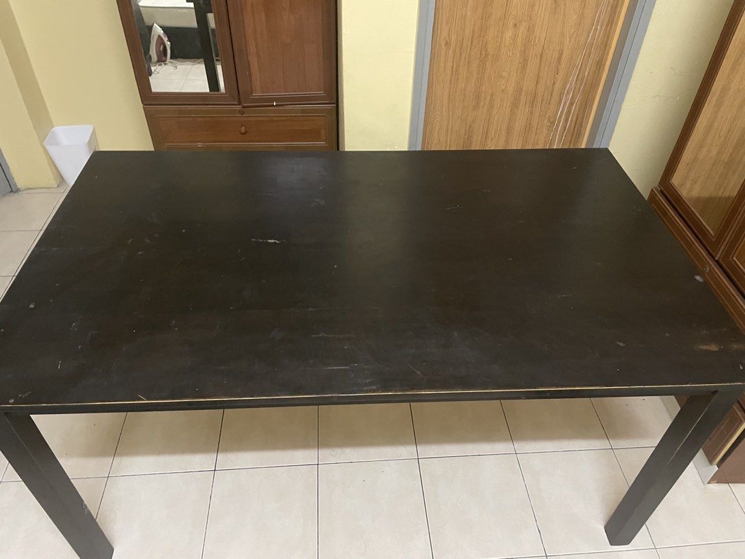 Dark Brown Rectangular Dining Table (Category: Tables & Sets) located in Shah Alam. Submitted by azwanazmer07957 (Listing ID 1461925252, Image 3). Description: - Dark brown solid wood table - Versatile: suitable for dining or as a work desk - Minor surface scratches from normal use - Boleh buka & pasang guna Allenkeys - Panjang: 4.75kaki - Lebar: 2.5kaki.