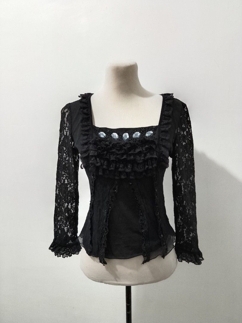 Dark protag ruffled/lace black top (Category: Blouses) located in Cotabato. Submitted by winonasallure (Listing ID 1461889940, Image 1). Description: size: semi med.