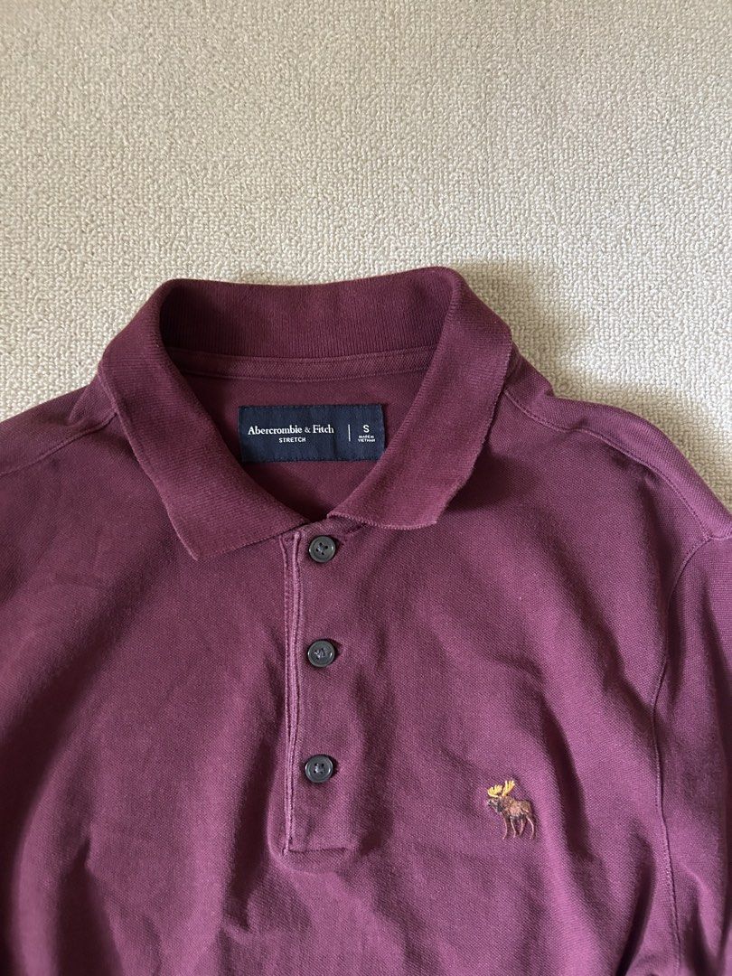 Dark Red Polo Abercrombie shirt (Category: Shirts) located in Quezon City. Submitted by y2klar (Listing ID 1461992413, Image 2). Description: Dark red abercrombie shirt Size-M-L Length-27 Width-21 10/10 Condition no flaws.