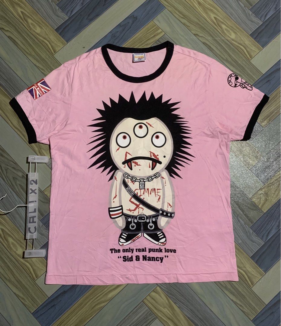DEVIL NUT RINGER TEE - S*X PISTOLS SID (Category: Tshirts & Polo Shirts ) located in Kapalong. Submitted by ac_thrift (Listing ID 1461954163, Image 1). Description: DEVIL NUT RINGER TEE - SEX PISTOLS SID Size: Large Dimes: W22 x 28 Color rate: 10/10 Condition: Excellent Issue: Yellowing sa may chest and back part nasa last 2 pics MoP: Gcash Location: Mindanao, Davao del Norte, Kapalong, 8113.