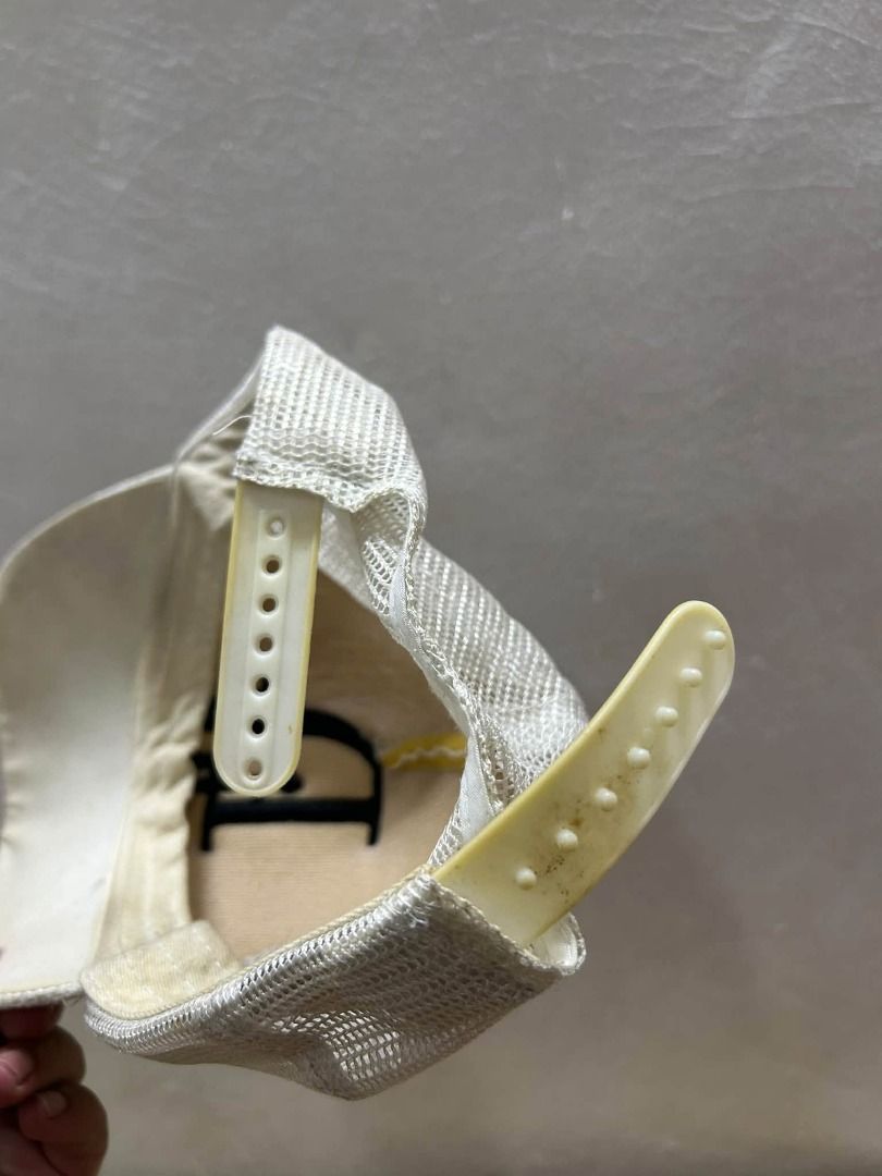 Dior Cap (Category: Caps & Hats) located in Caloocan City. Submitted by j3ngsanity (Listing ID 1461954546, Image 3). Description: yellow stains.