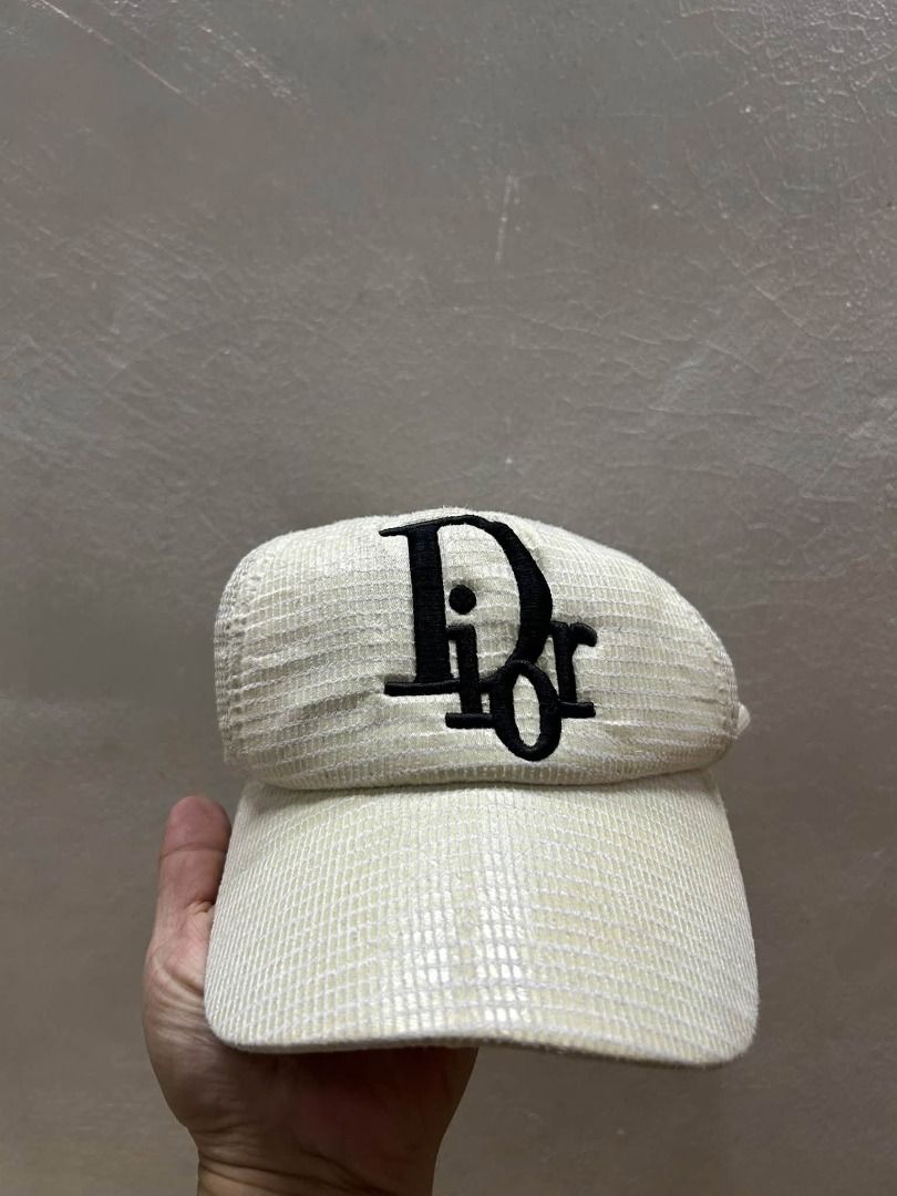 Dior Cap (Category: Caps & Hats) located in Caloocan City. Submitted by j3ngsanity (Listing ID 1461954546, Image 1). Description: yellow stains.