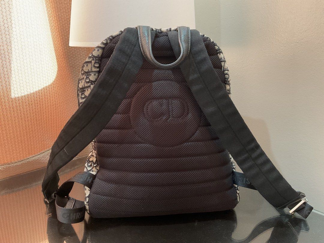 Dior Oblique Canvas Backpack (Category: Luxury Bags & Wallets) located in Cagayan de Oro. Submitted by ericlarkyl89146 (Listing ID 1461848414, Image 3). Description: - Iconic Dior Oblique canvas - Black leather trim and straps - Two zip compartments for organization - Padded back panel for comfort - Made in Italy - Perfect for everyday or travel.