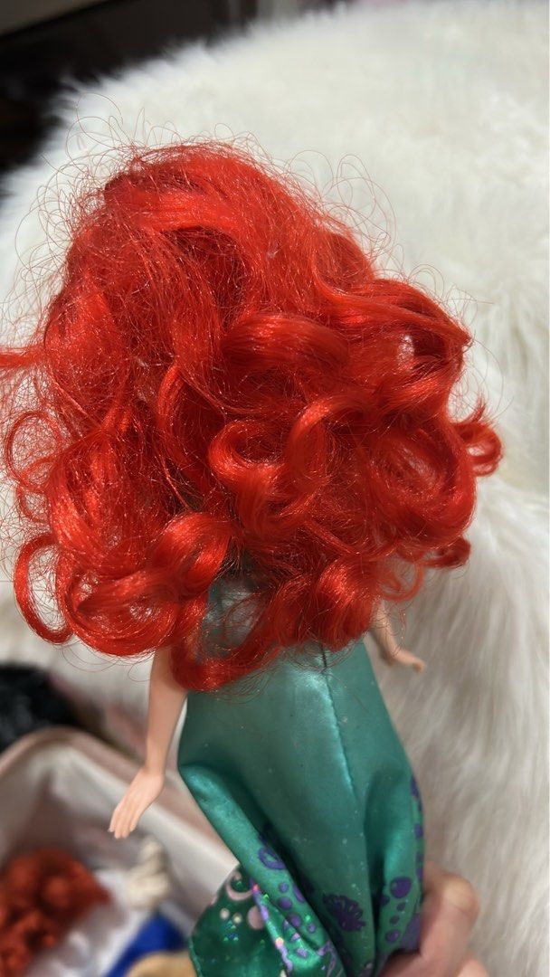Disney Princess Ariel Doll (Category: Plushies & Soft Toys) located in Batangas. Submitted by nommi26 (Listing ID 1461966133, Image 2). Description: WYSIWYG - Ariel doll from Disney's The Little Mermaid - Iconic red hair - Sparkly green dress with seashell and starfish pattern - Hair is slightly messy but can be styled - Great gift for any Disney fan.