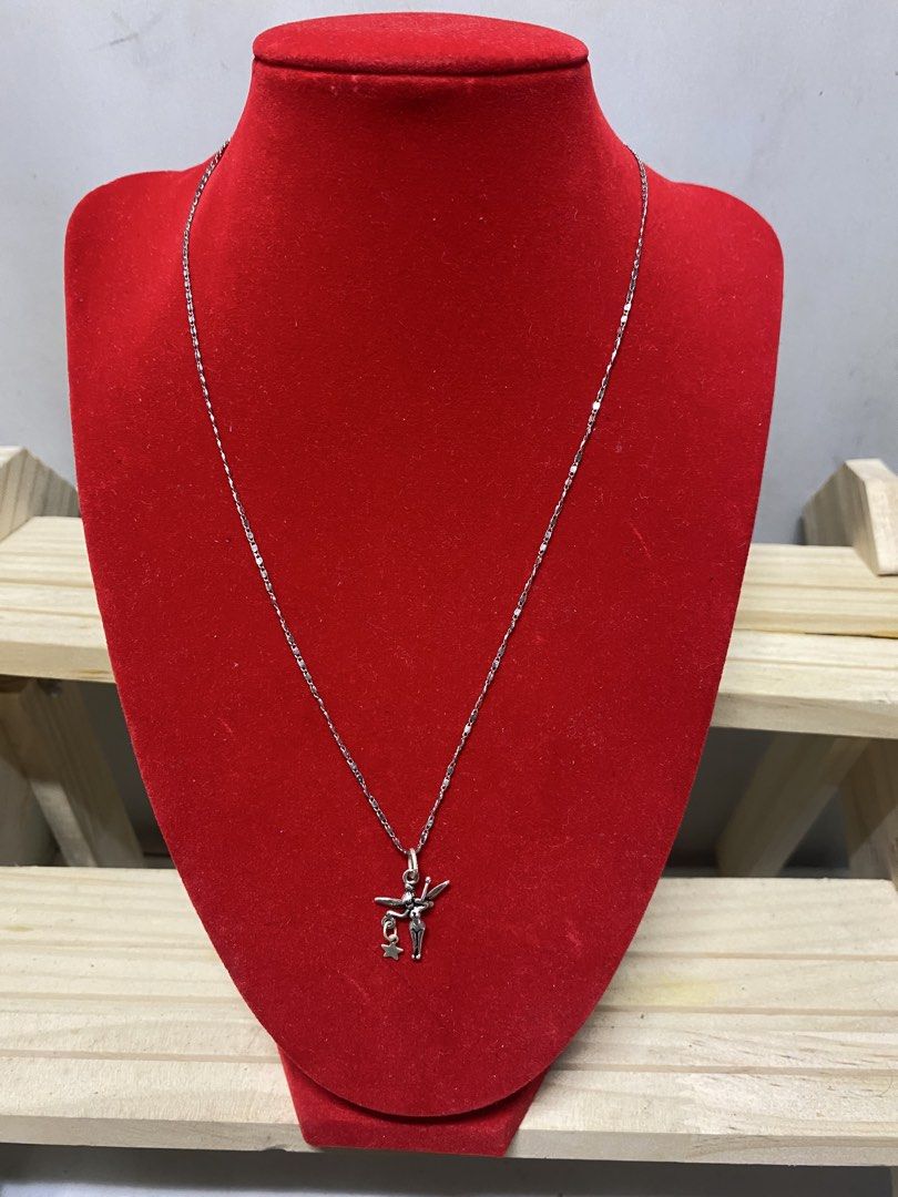 Disney Tinkerbell Sterling Silver 925 Necklace (Category: Necklaces) located in Pasacao. Submitted by wengpullar37205 (Listing ID 1461986910, Image 1). Description: - Genuine sterling silver (marked 925) - Adorable Tinkerbell pendant with a tiny star charm - Delicate and sparkly chain - Secure spring ring clasp - Ideal gift for Disney fans.