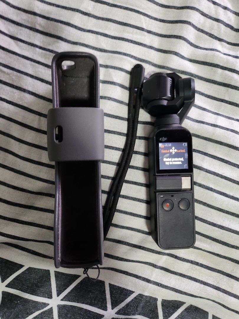 DJI Osmo Pocket 1 (Category: Cameras) located in Pasig City. Submitted by zharre.062923 (Listing ID 1461799552, Image 3). Description: - DJI Osmo Pocket gimbal camera - Capture smooth video effortlessly - Compact and portable for travel - Includes original protective case - Excellent working condition - Ideal for your next adventure!.
