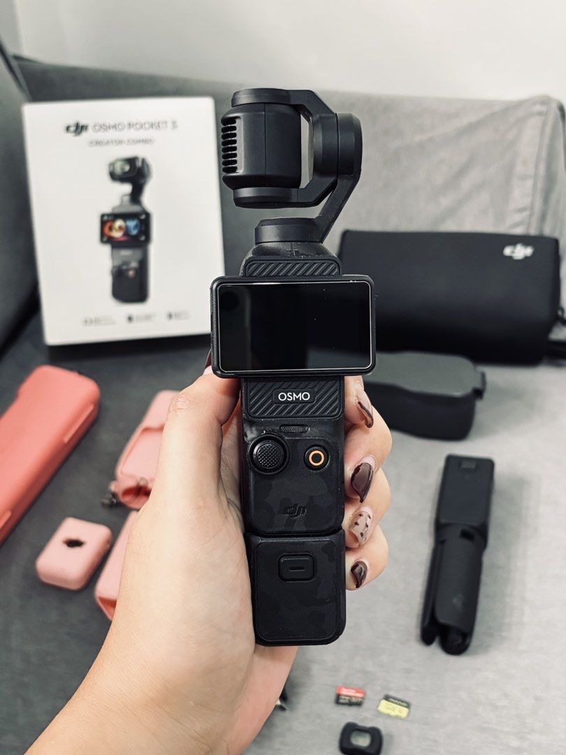 DJI Osmo Pocket 3 Creator Combo (Category: Video Cameras) located in Quezon. Submitted by cjstaana08 (Listing ID 1461810797, Image 3). Description: DJI Osmo Pocket 3 Creator Combo Like new condition ✨ Inclusions: DJI Osmo Pocket 3 Camera DJI Mic 2 Transmitter & Windscreen Magnet Battery Handle Handle with 1/4” thread Osmo Mini Tripod Wide-Angle Lens Osmo Pocket 3 Carrying Bag Protective Cover Type-C Cable Silicone Case (Memory cards are bought se