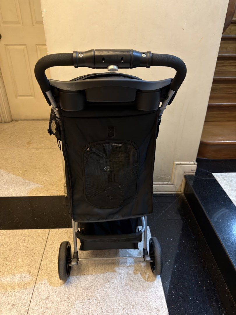 Doogo Pet Stroller - Black (Category: Homes & Other Pet Accessories) located in Quezon City. Submitted by tanyasy_52 (Listing ID 1461904562, Image 3). Description: - Black Doogo pet stroller - Mesh top for ventilation and visibility - Bottom storage basket included - Handlebar with cup holders - Easy to fold and transport - Perfect for taking your pet out price negotiable.