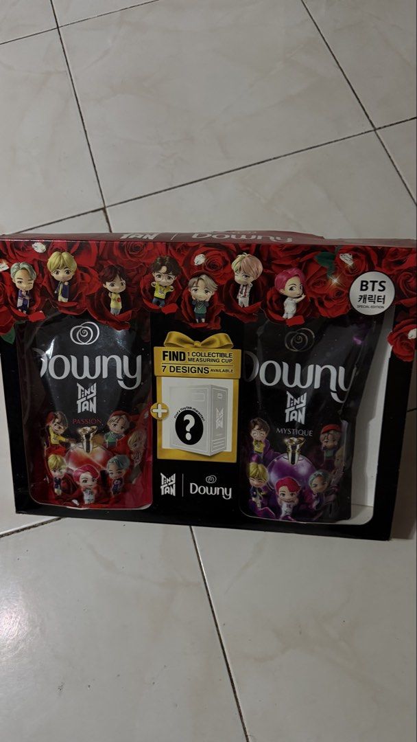 Downy TinyTAN BTS Fabric Softener Set with Collectible Cup (Category: Designer & Blind Box Toys) located in Manila. Submitted by nobleangel (Listing ID 1461887846, Image 1). Description: - Limited Edition Downy Fabric Softener Set - Features adorable TinyTAN characters from BTS - Includes two popular scents: Passion and Mystique - Comes with a collectible measuring cup (7 unique designs to collect!) - Ideal for BTS fans and ensuring your laundry 