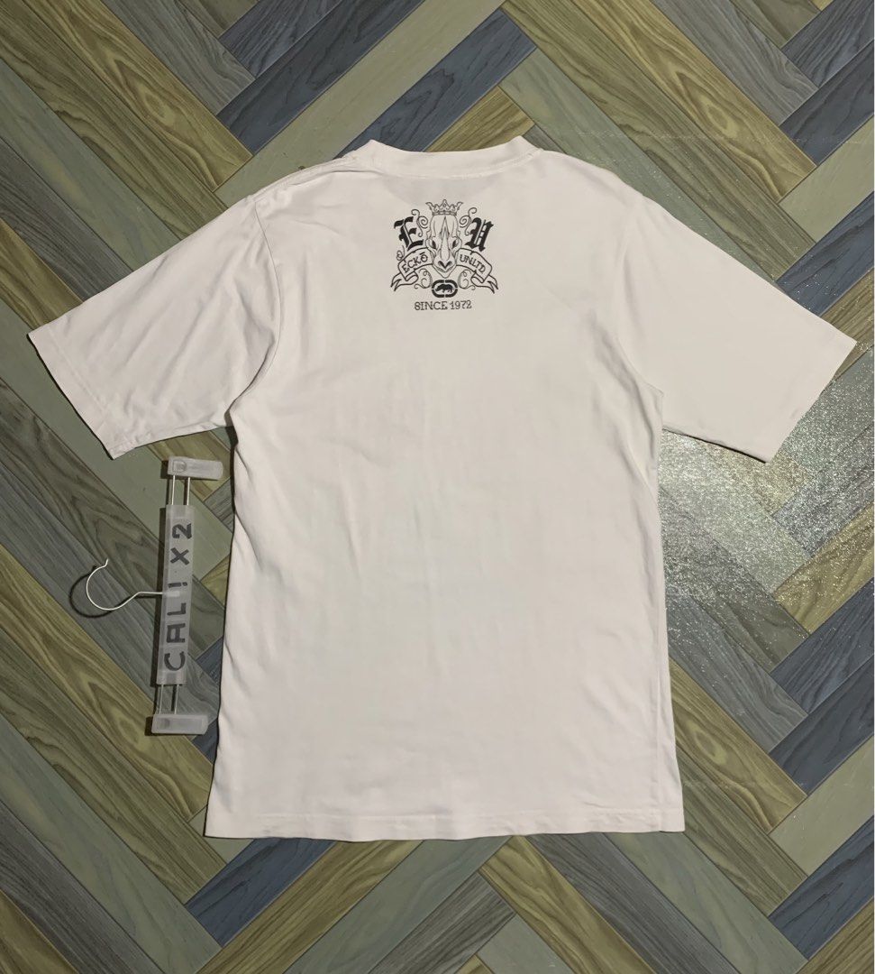 ECKO UNLTD GRAPHIC SHIRT (Category: Tshirts & Polo Shirts ) located in Kapalong. Submitted by ac_thrift (Listing ID 1461953758, Image 2). Description: ECKO UNLTD GRAPHIC SHIRT Dimes: W18.9 x L29 Color rate: 9.5/10 Condition: Vgood/Excellent Issue: Sign of use, Cut neck tag & faded washtag MoP: Gcash Location: Mindanao, Davao del Norte, Kapalong, 8113.