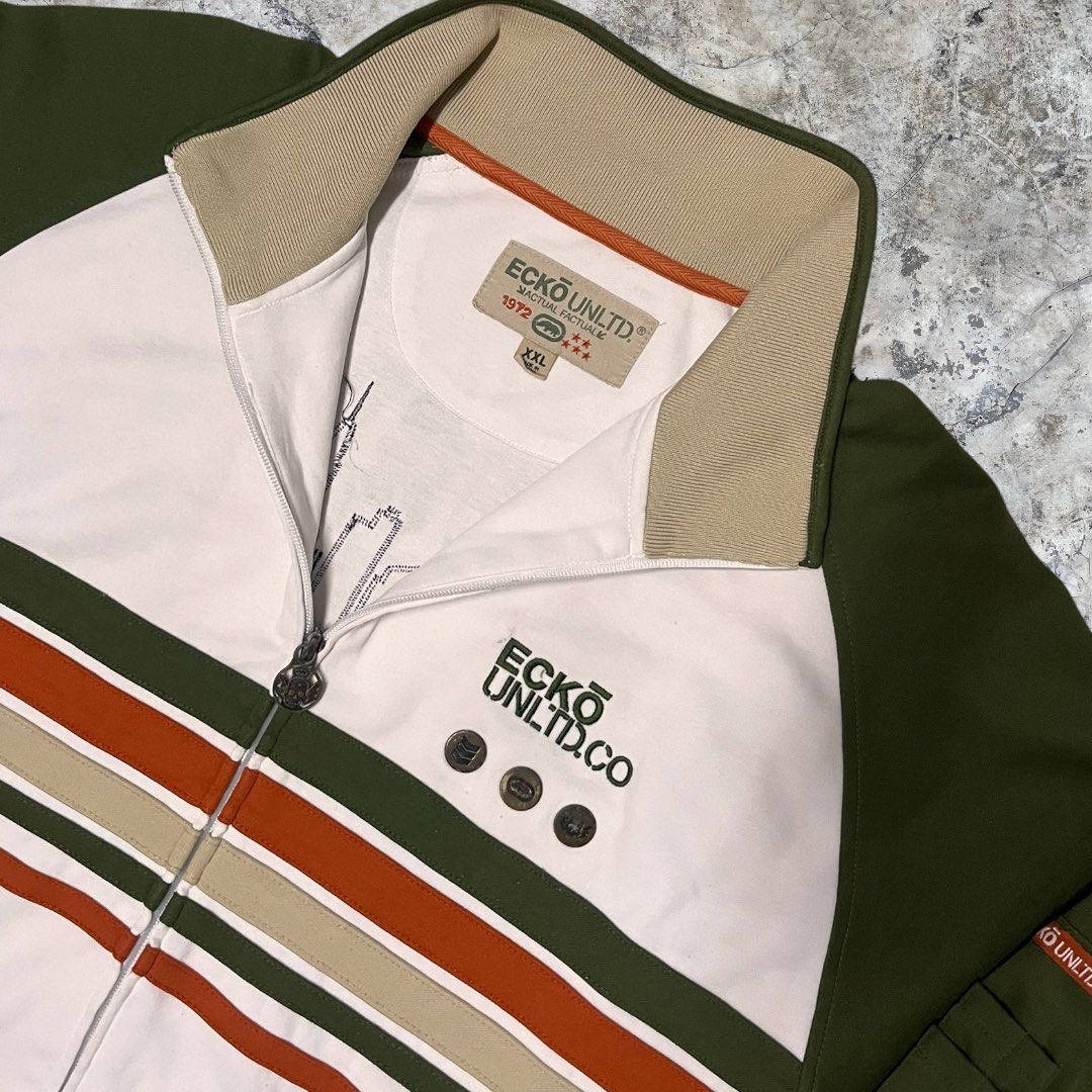 Ecko Unltd Skyscraper Camo Track Jacket (Category: Coats, Jackets and Outerwear) located in Manila. Submitted by zstudios69 (Listing ID 1461992720, Image 3). Description: READ READ READ READ READ!!!!! DETAILED PHOTOS ARE POSTED XXL on tag Dimensions: W: 26 L: 32 Issue(s): NEGOTIABLE DM ME YOUR OFFERS DM FOR DETAILED PICTURES Will give a good deal if you purchase another garment from my account A great piece to add to your fly ass wardrobe SHIPPIN