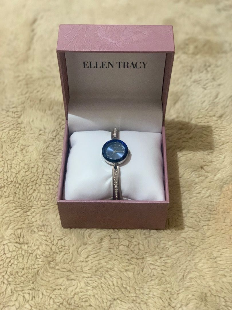Ellen Tracy Silver Tone Mini Faceted Bezek Bangle Watch (Category: Women's Watches) located in Caloocan City. Submitted by ayajaneee (Listing ID 1461858237, Image 2). Description: - Ellen Tracy watch - Blue dial - Silver-tone bangle with clear stones - Includes original pink box with floral embossing - Battery information available on the box - Ideal for everyday wear or as a gift.