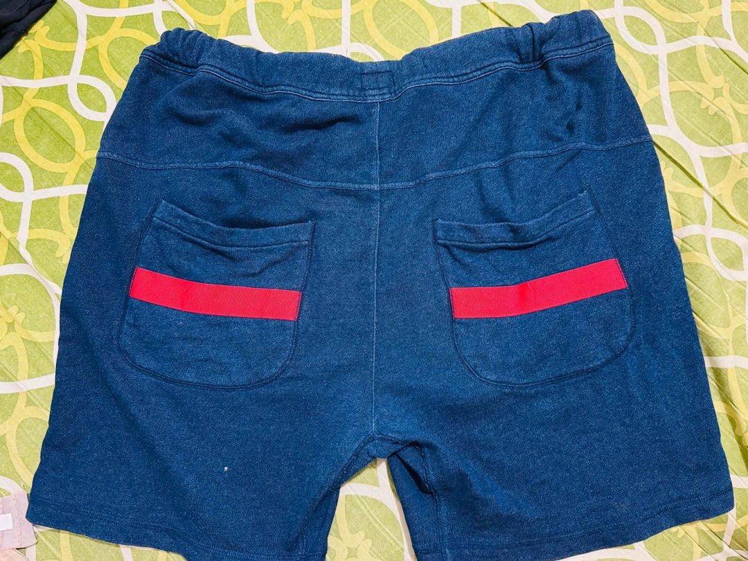 EVISU Custom Made Denim Shorts XL (Category: Shorts) located in Guagua. Submitted by eloisa.dpthrifts11 (Listing ID 1461995761, Image 2). Description: -Waist: 38-42” -Length: 20” - Brand: EVISU - Type: Custom Made Denim Shorts - Size: XL - Features: Iconic EVISU logo on back - Detail: Two red stripes on back pockets - Condition: Small mark on front (refer to last photo) - Style: Great for casual wear -issue small pinhole .